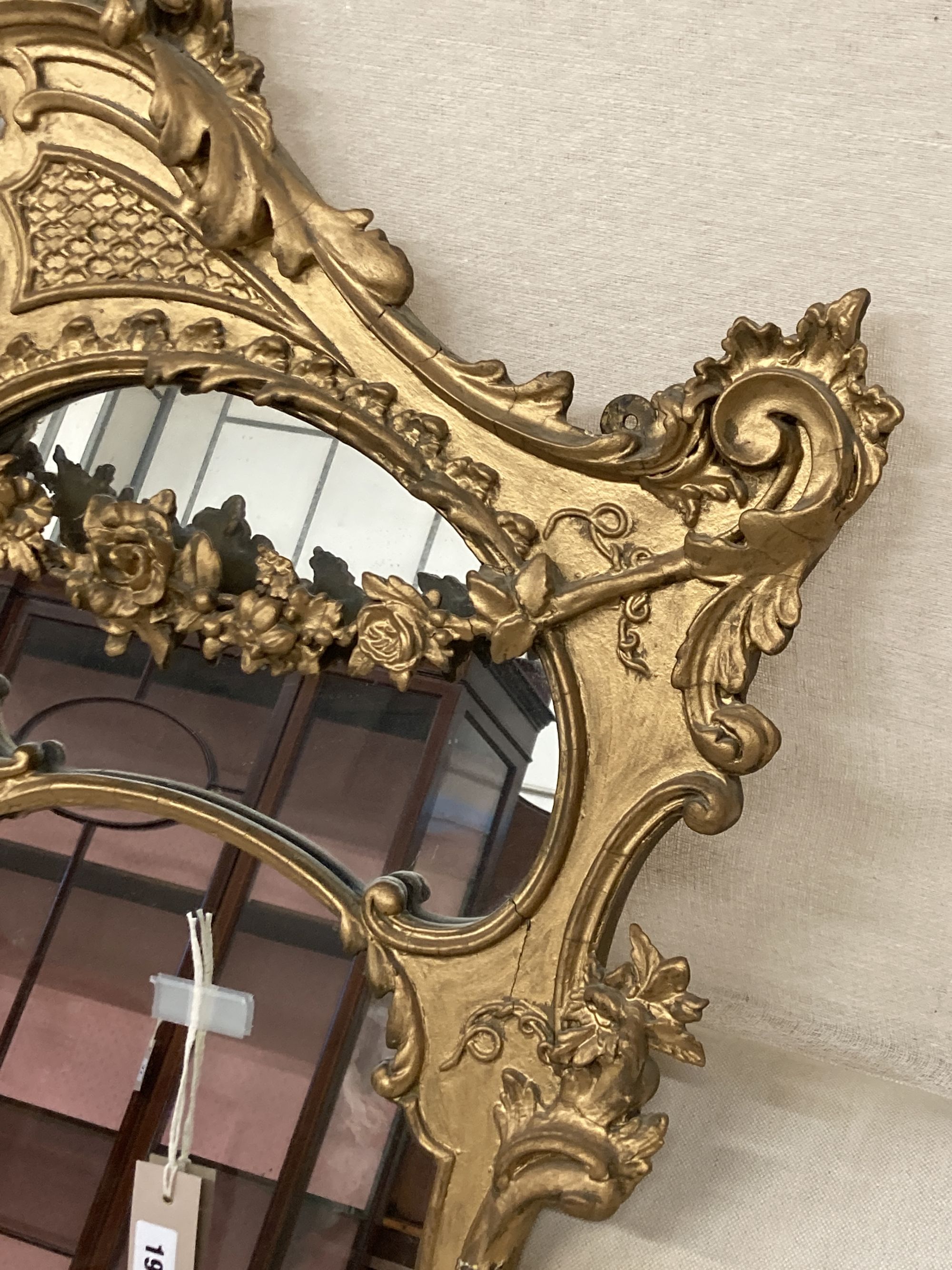 A late Victorian giltwood and gesso overmantel mirror, width 108cm, height 115cm